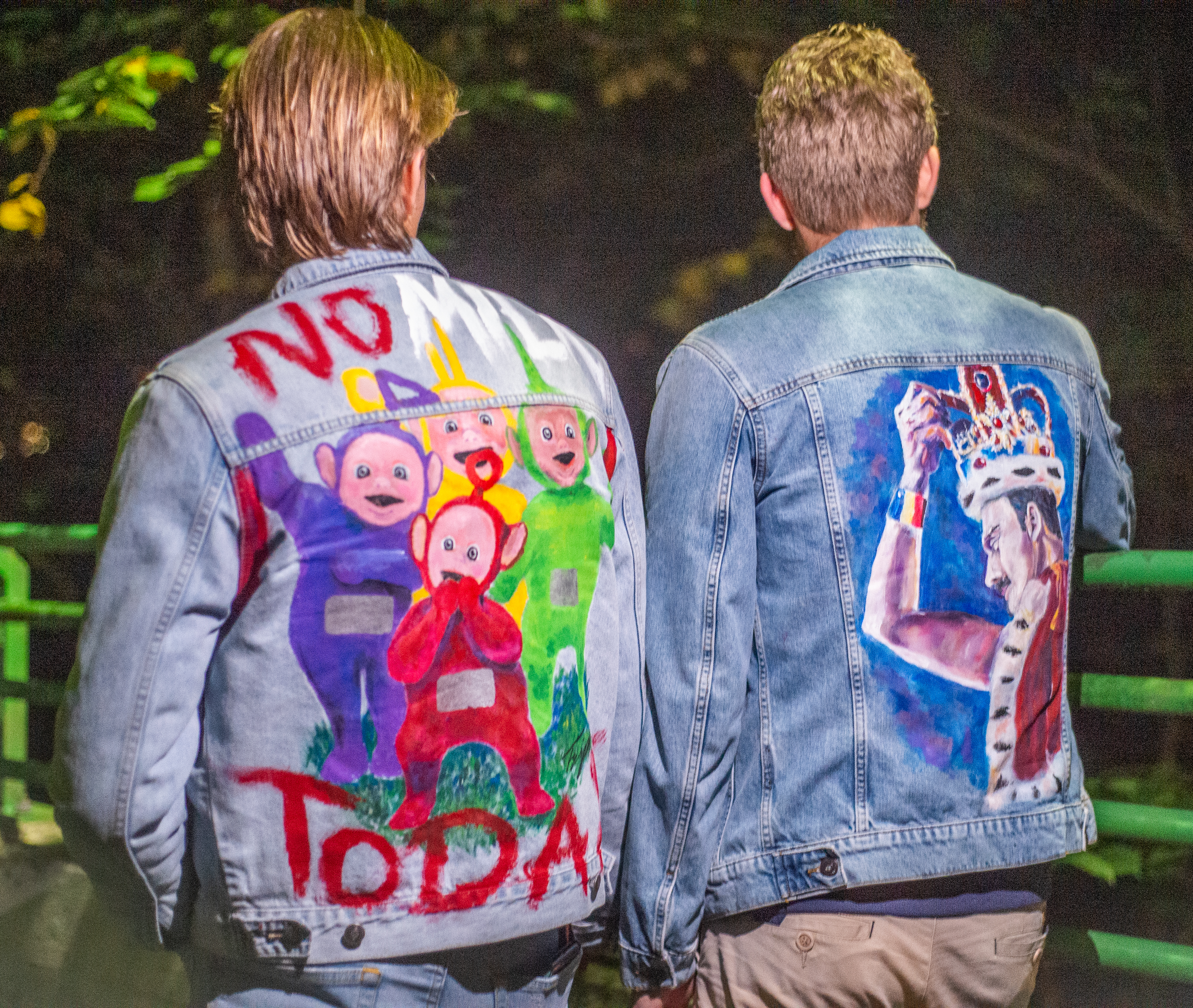 picture of two guys with painted jackets